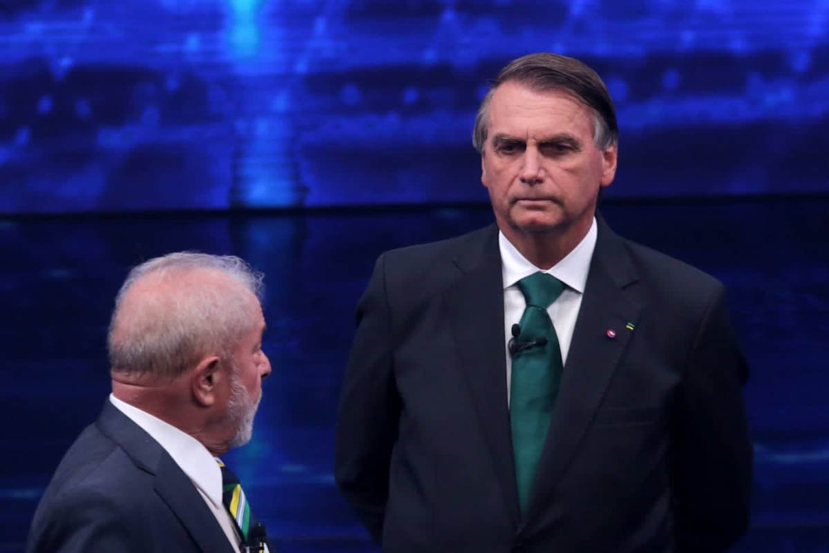 Lula e Jair Bolsonaro durante debate na band eleiçoes 2022