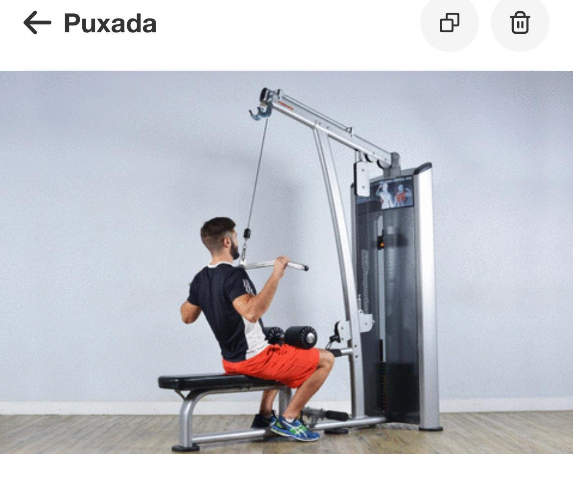 Foto de homem puxando peso em uma máquina - Metrópoles