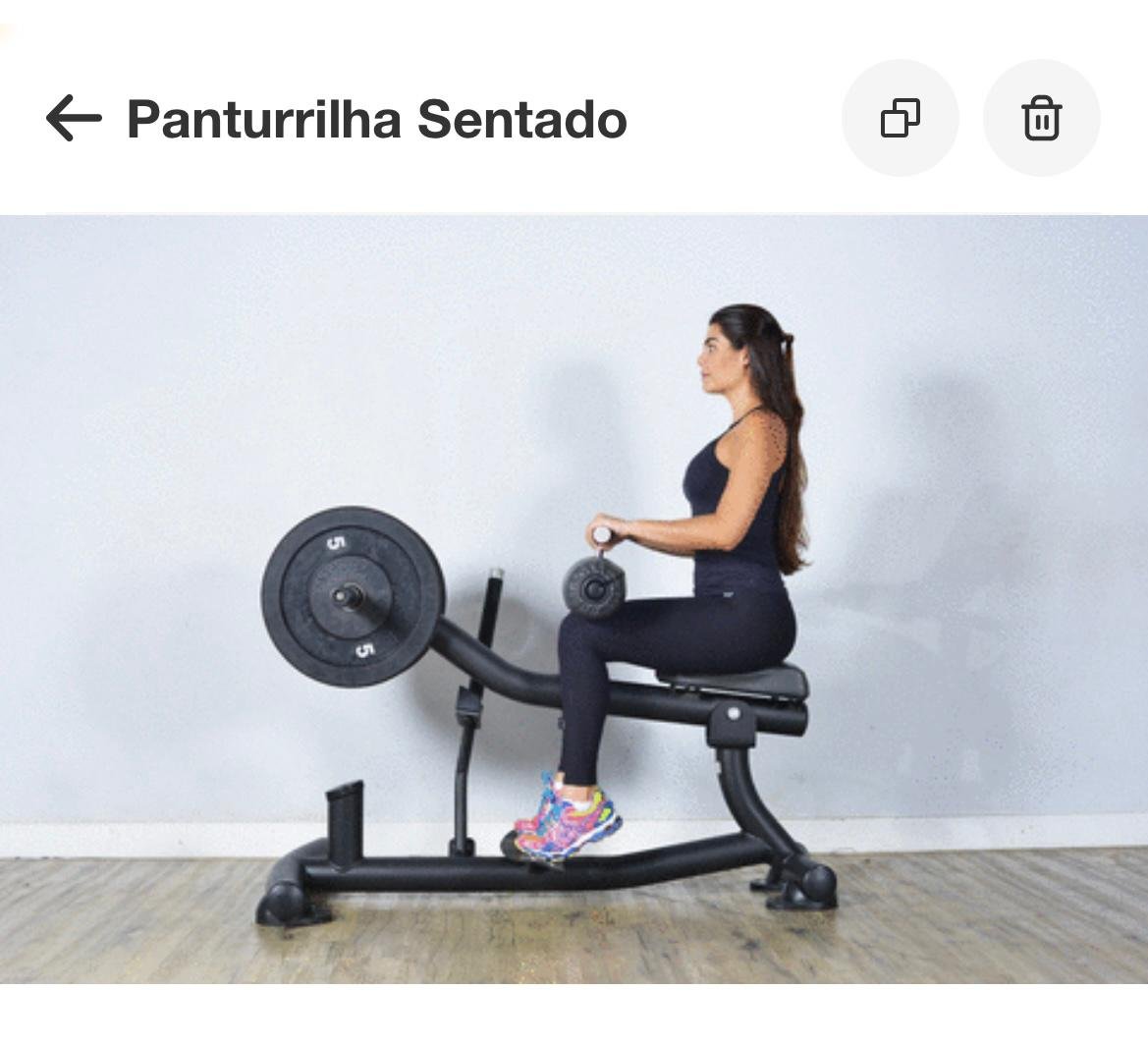 Mulher sentada em uma máquina, fazendo exercício para as panturrilhas - Metrópoles