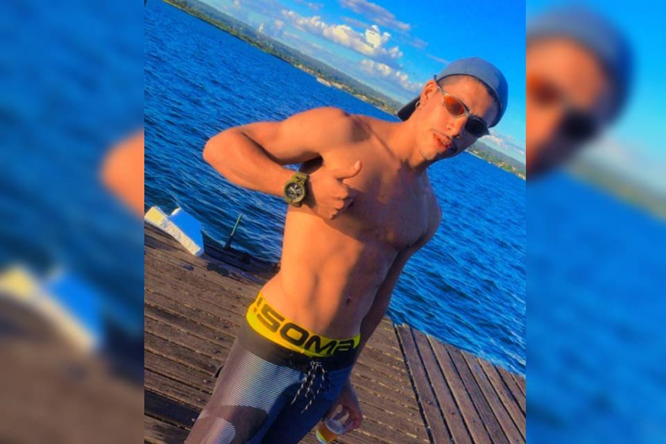Jovem sem camisa à beira do Lago Paranoá - Metrópoles