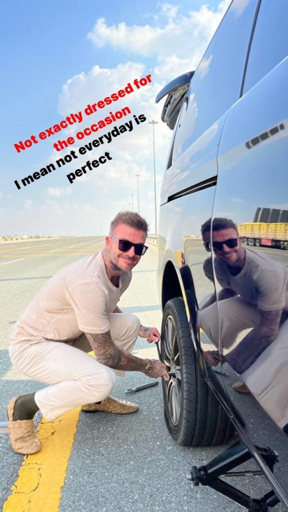 Beckham troca pneu do carro no Catar: