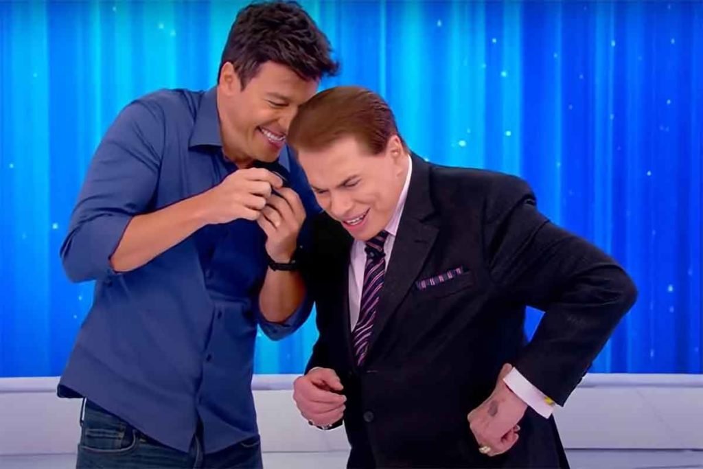 Print colorido de Rodrigo Faro e Silvio Santos