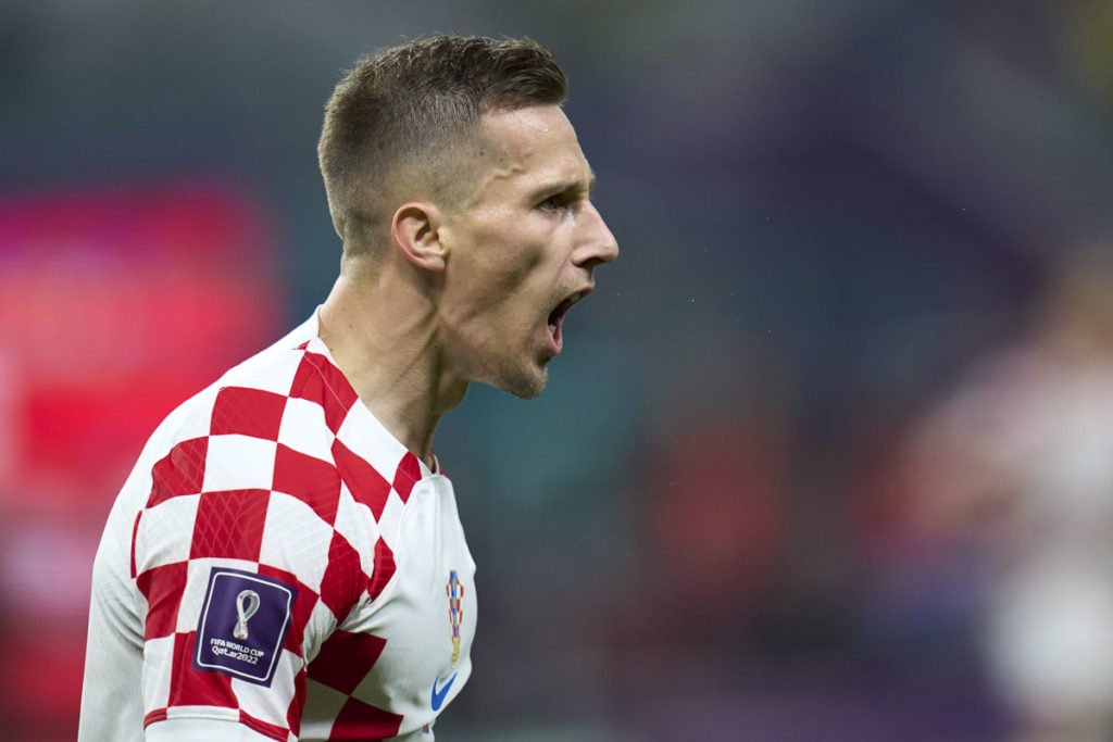 Mislav Orsic, da Croácia, comemora depois de marcar o segundo gol de seu time durante a partida de 3º lugar da Copa do Mundo da FIFA Qatar 2022