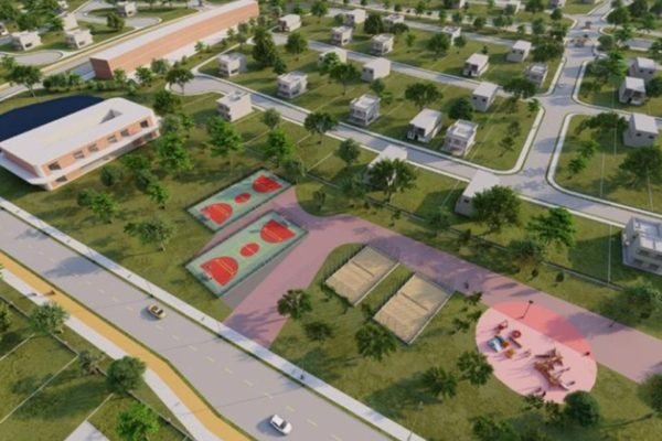 Condomínio com área verde e quadras de esporte visto de cima