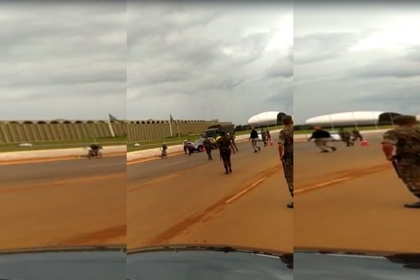 Bolsonaristas acampados no QG do Exército hostilizam carro com bandeira do PT que passava por avenida interna. Militares tentam conter confusão - Metrópoles