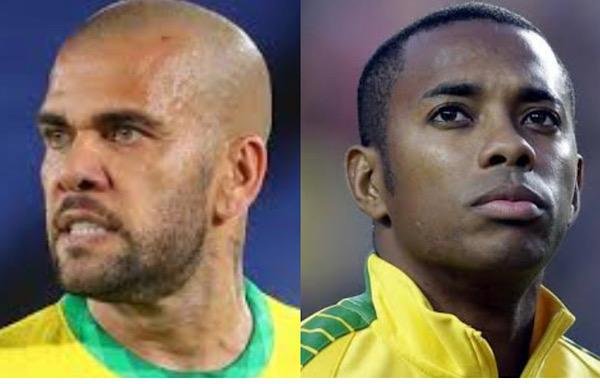 Fotos justapostas dos jogadores de futebol Daniel Alves e Robinho, ambos com as camisas da seleção brasileira - Metrópoles