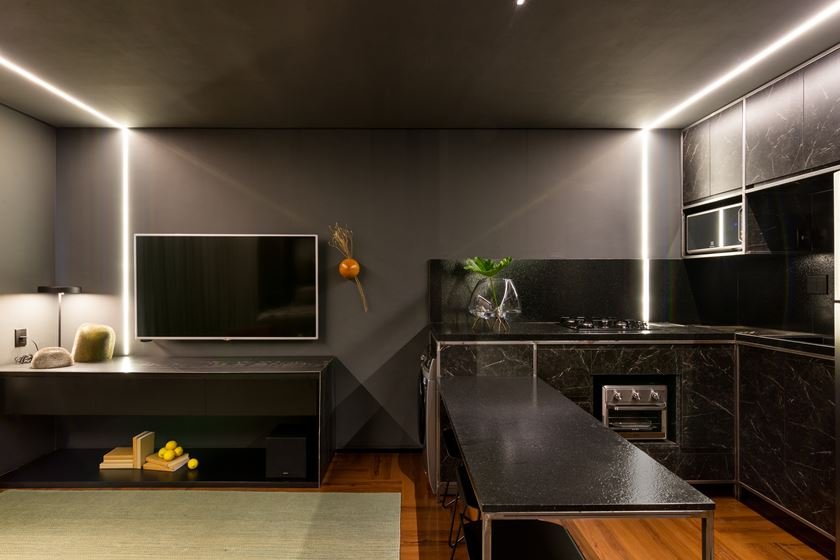 Foto de uma sala e cozinha conjugada
