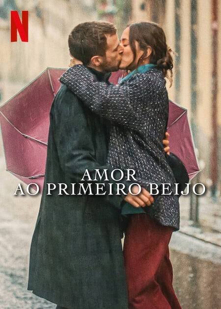 Imagem colorida de um homem e uma mulher se beijando - Metrópoles