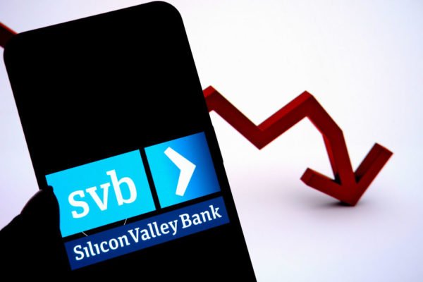 In this photo illustration, a Silicon Valley Bank logo is