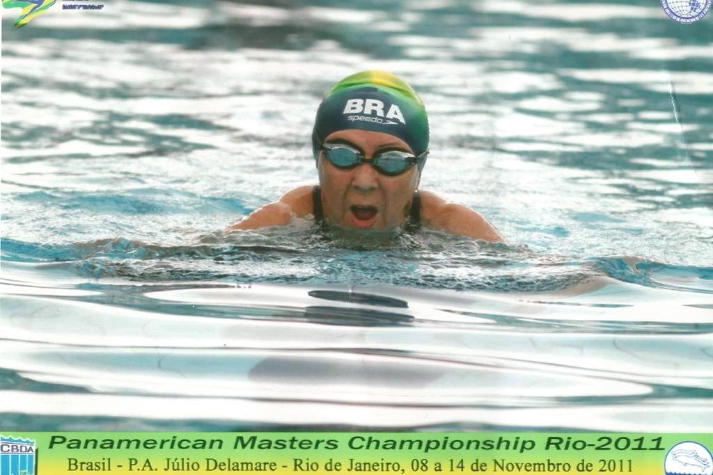 Color image: woman swimming - Metropolis