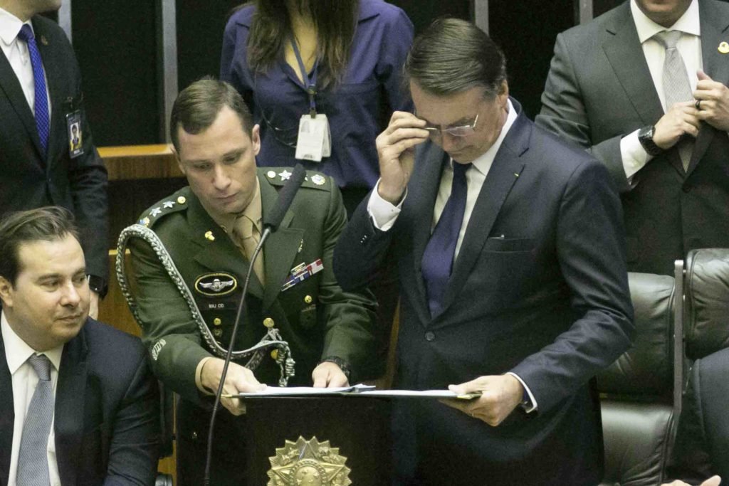 mauro Cid e Bolsonaro durante posse presidencial 2019 no Senado Federal