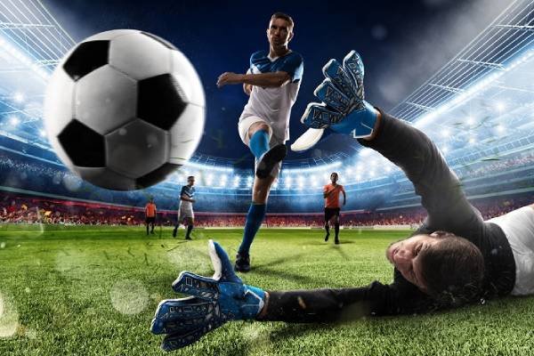 Fotografia colorida de pênalti com bola entrando no gol-Metrópoles