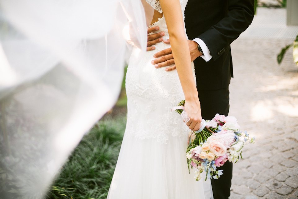 Bride and groom hugging