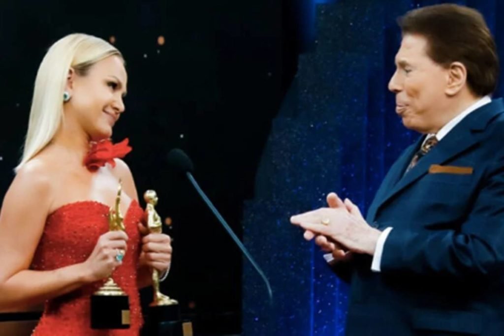 Imagem colorida de Eliana e Silvio Santos - Metrópoles