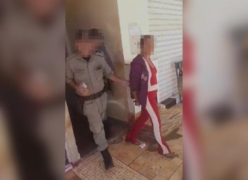 Print de vídeo de mulher que foi presa por cortar testículo de esposo
