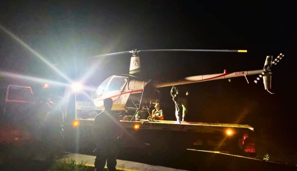 Imagem colorida de helicóptero apreendido pela PF - Metrópoles