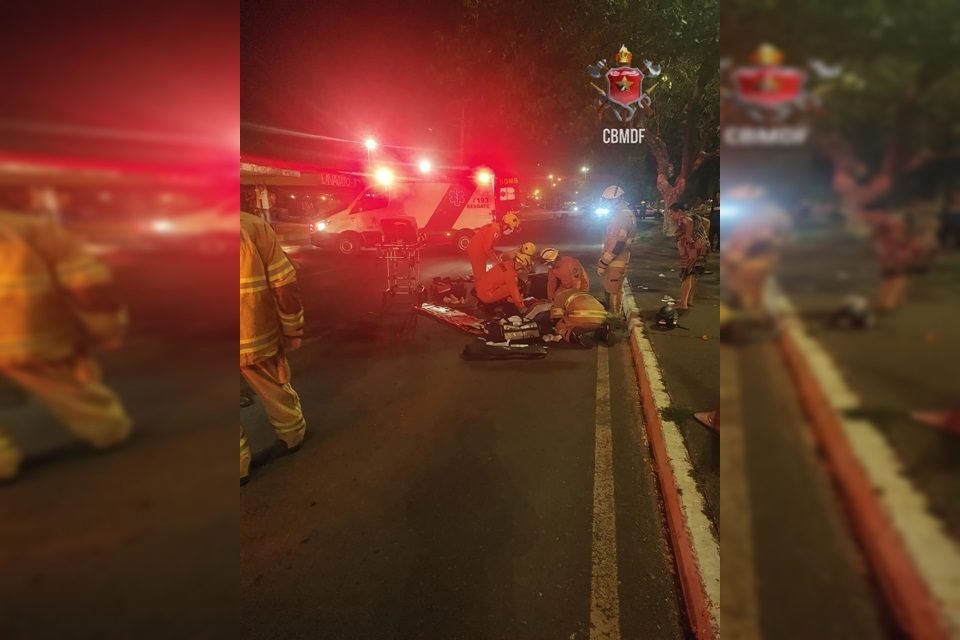 Viatura e bombeiro socorrem pessoa em rua