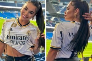 Bia Michelle posa no estádio do Real Madri, na Espanha, com a blusa de Vini Jr. - Metrópoles