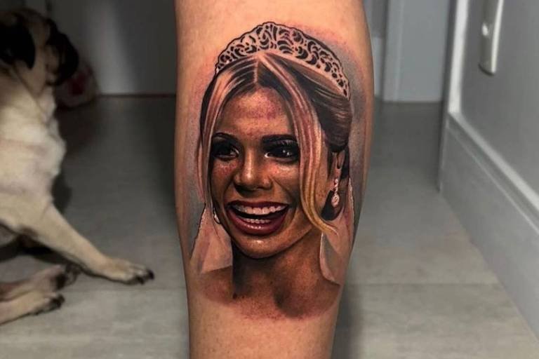 MC Guimê tatua rosto de Lexa - Metrópoles