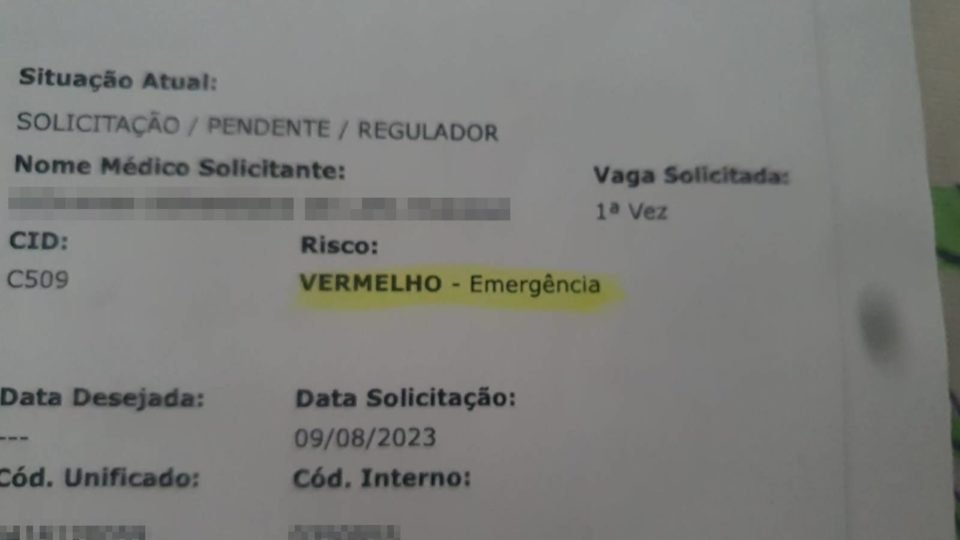 Foto do documento sinalizando risco vermelho