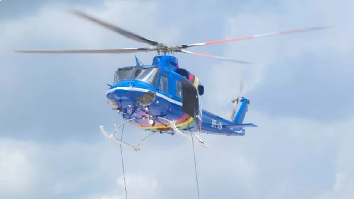 Imagem colorida de helicoptero-militar-que-sumiu-com-7-passageiros da Guiana